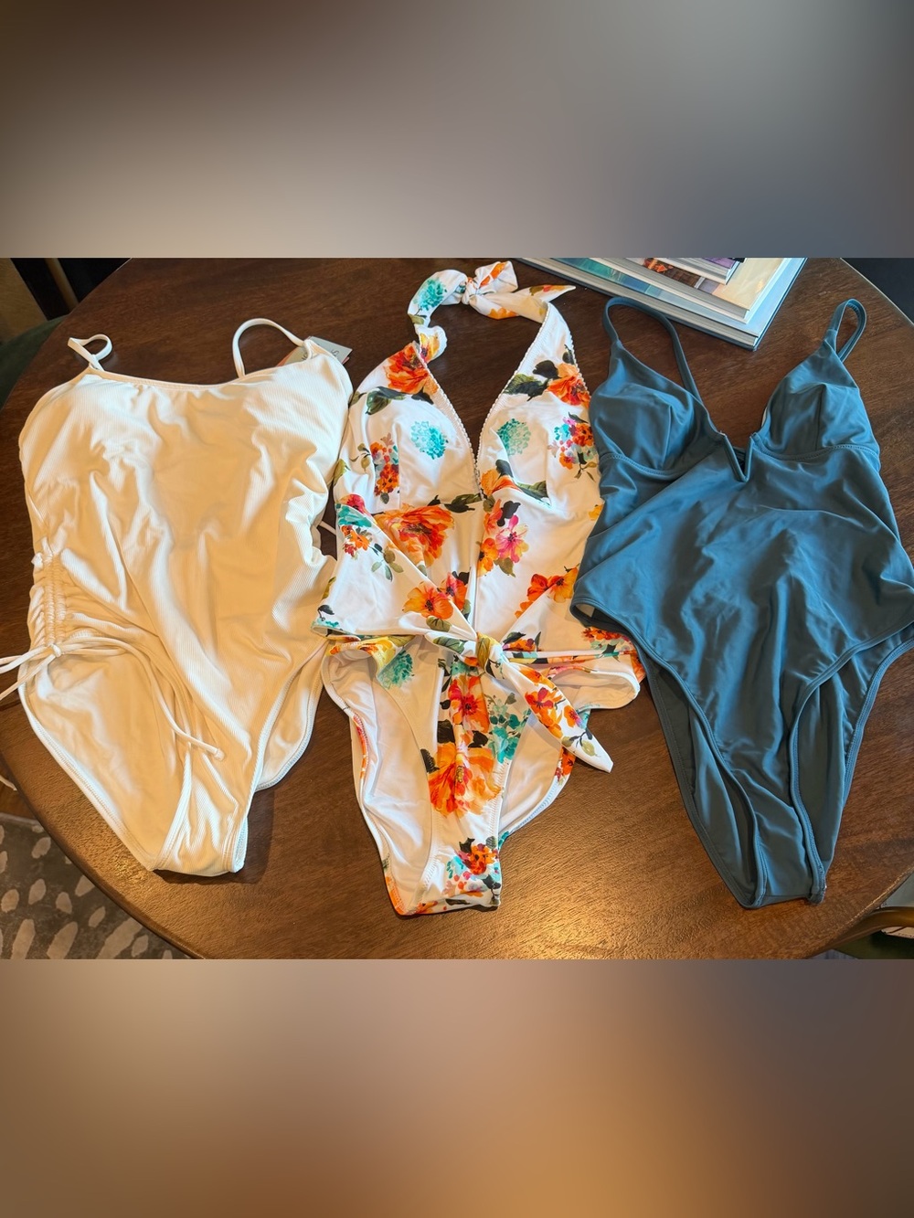 All Three - One-Piece Swimsuits in White, Floral, and Teal